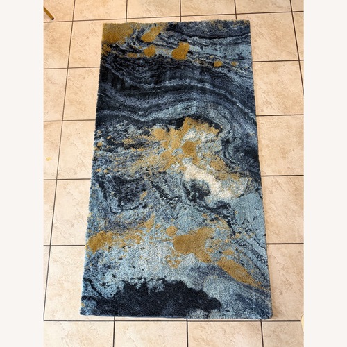 Used Abstract Multicolor Contemporary Area Rug for sale on AptDeco