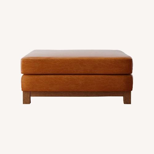 Used Pottery Barn Jake Light Brown Leather Ottoman for sale on AptDeco