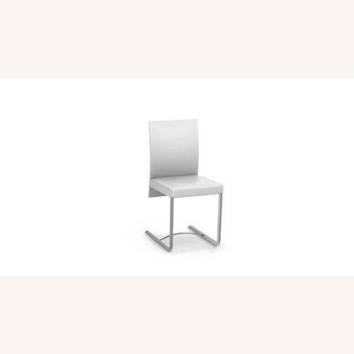 Used Roche Bobois Amplitude White Dining Chairs for sale on AptDeco