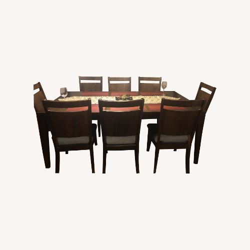 Used Bob's Discount Furniture Dark Brown Dining Table for sale on AptDeco