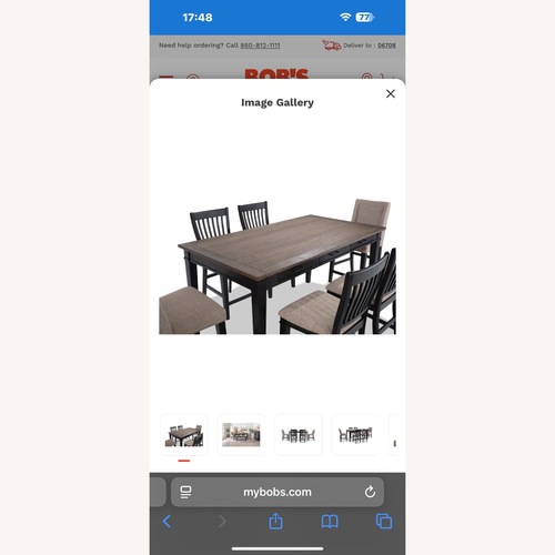 Used Bob's Discount Furniture Dark Brown Dining Table for sale on AptDeco