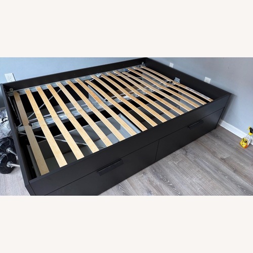 Used IKEA Black Wood Full Bed for sale on AptDeco