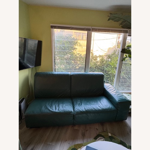Used Green Leather 2 Seater Sofa for sale on AptDeco