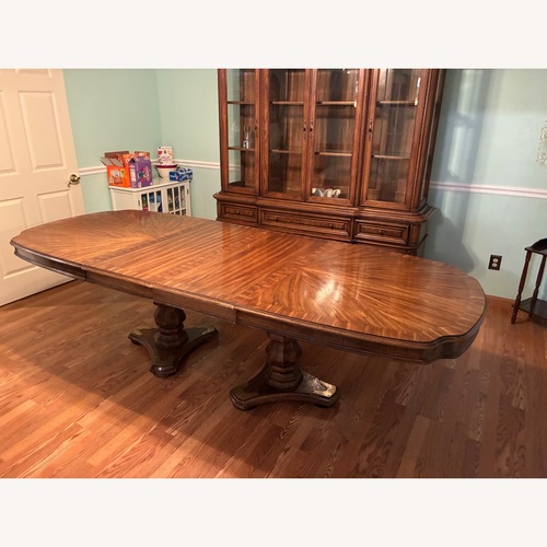 Used Empire Furniture USA Light Brown Dining Table for sale on AptDeco