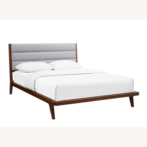 Used Raymour & Flanigan Dark Brown Wood Queen Bed  for sale on AptDeco