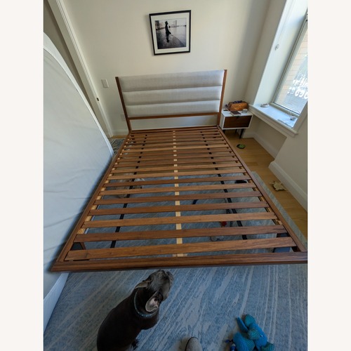 Used Raymour & Flanigan Dark Brown Wood Queen Bed  for sale on AptDeco