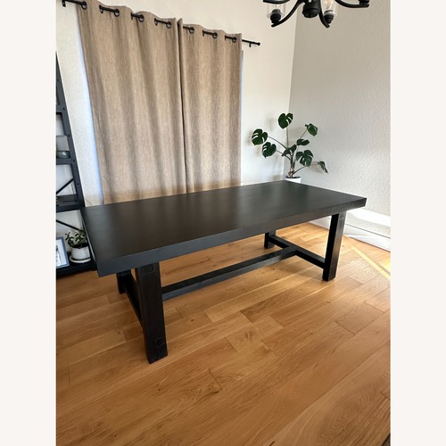 Used Pottery Barn Black Wood Dining Set + 6 Chairs for sale on AptDeco