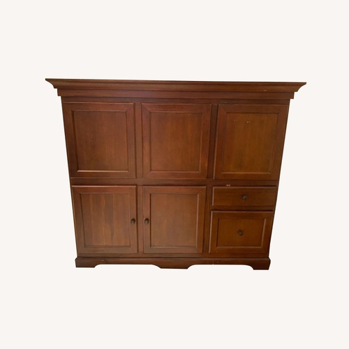 Used Pottery Barn Dark Brown Wood Desk for sale on AptDeco