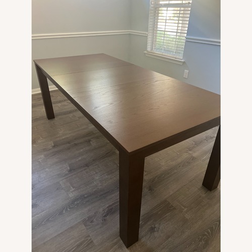 Used Burrow Dining Table Harvest -Walnut for sale on AptDeco