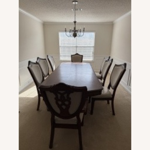 Used  Dark Wood Dining Room Set for sale on AptDeco
