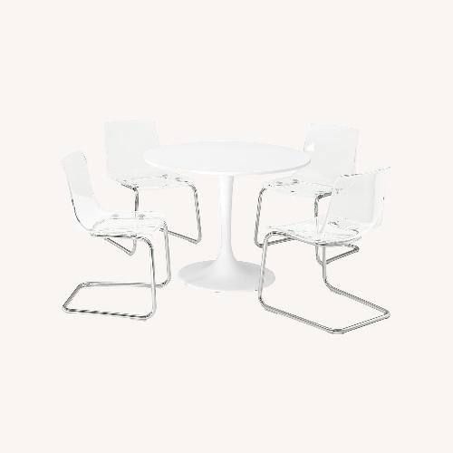 Used IKEA DOKSTA White Table and 3 Transparent Chrome Chairs for sale on AptDeco