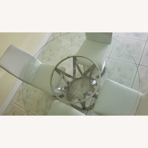 Used Kyrie Transparent Glass Dining Table With Chrome Base for sale on AptDeco