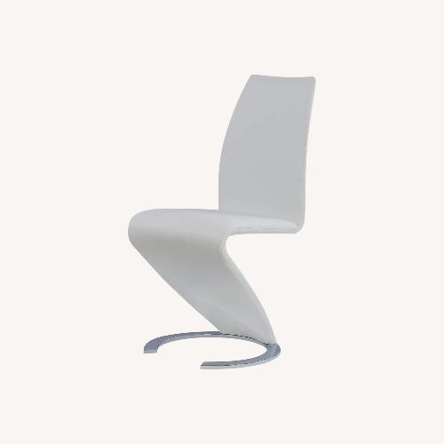 Used Safavieh White Faux Leather Dining Chairs for sale on AptDeco
