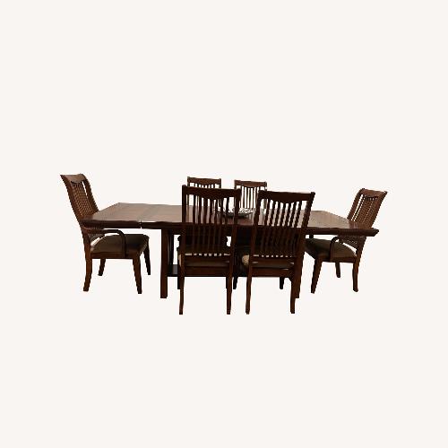 Used Jordan's Furniture Dark Brown Wood Dining Sets for sale on AptDeco