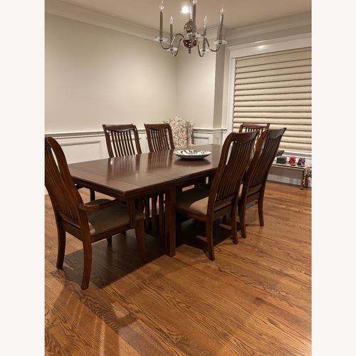 Used Jordan's Furniture Dark Brown Wood Dining Sets for sale on AptDeco