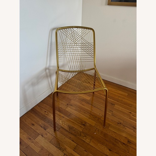 Used CB2 Alpha Brass Dining Chair for sale on AptDeco