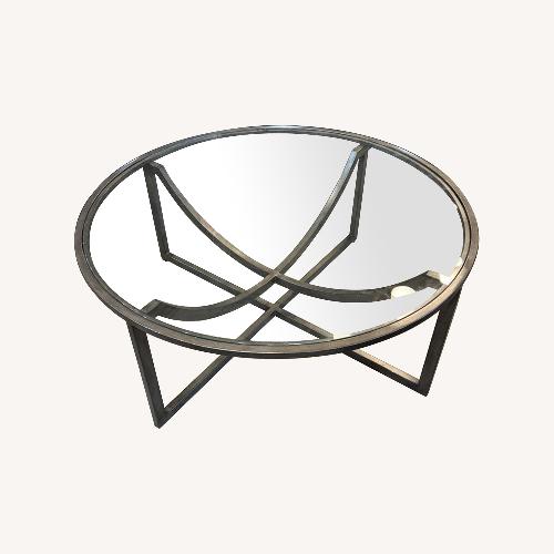 Used Epicenters Round Glass & Metal Coffee Table for sale on AptDeco