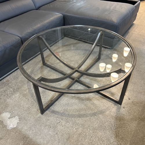 Used Epicenters Round Glass & Metal Coffee Table for sale on AptDeco