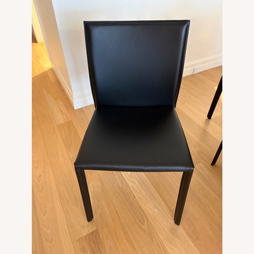 Used EQ3 Acel Black Leather Dining Chairs for sale on AptDeco