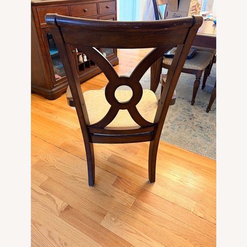 Used Dark Brown Wood Dining Table Set for sale on AptDeco