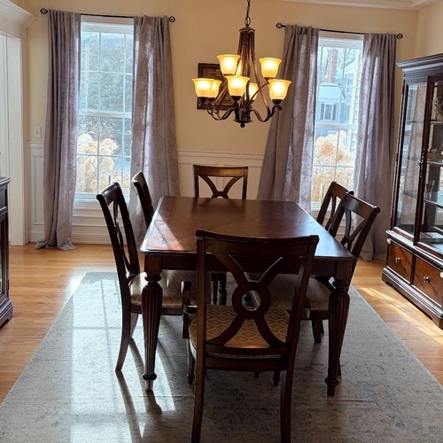 Used Dark Brown Wood Dining Table Set for sale on AptDeco