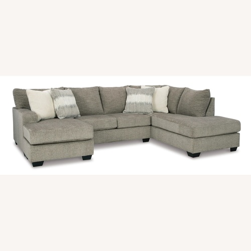 Used Ashley Furniture 2 Piece Sectional + Ottoman for sale on AptDeco