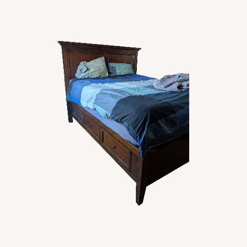 Used Macy's Sanibel Dark Brown Wood Queen Bed for sale on AptDeco