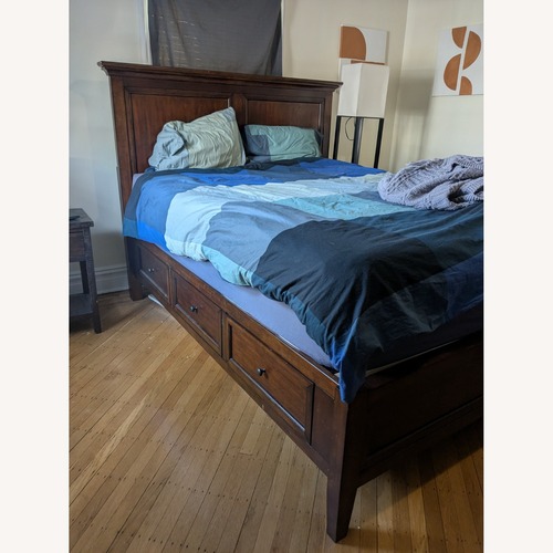 Used Macy's Sanibel Dark Brown Wood Queen Bed for sale on AptDeco