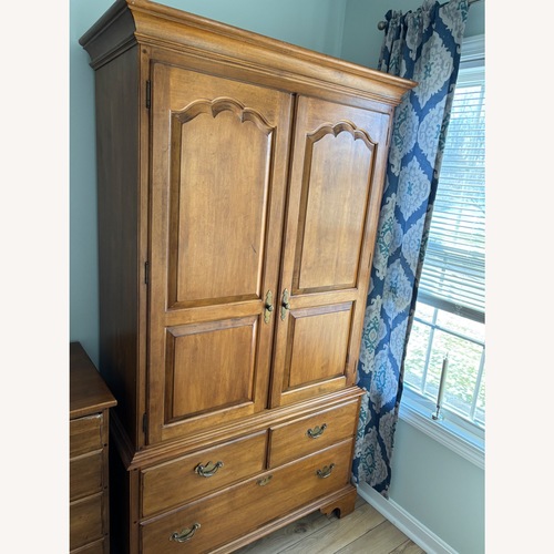 Used Ethan Allen Natural Wood Armoire for sale on AptDeco