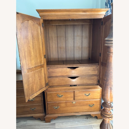 Used Ethan Allen Natural Wood Armoire for sale on AptDeco