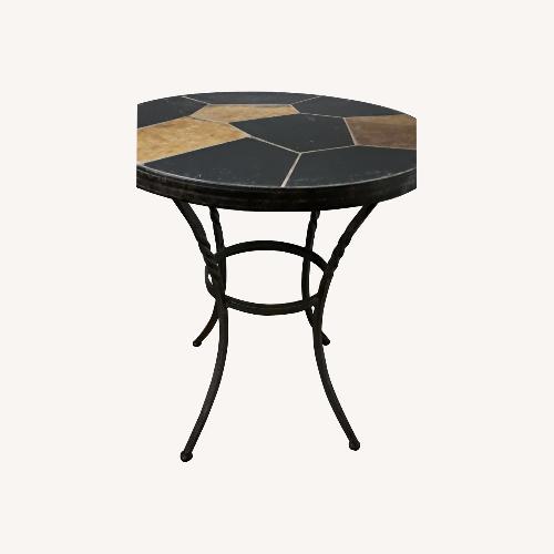 Used Small Round Cast Iron Table for sale on AptDeco