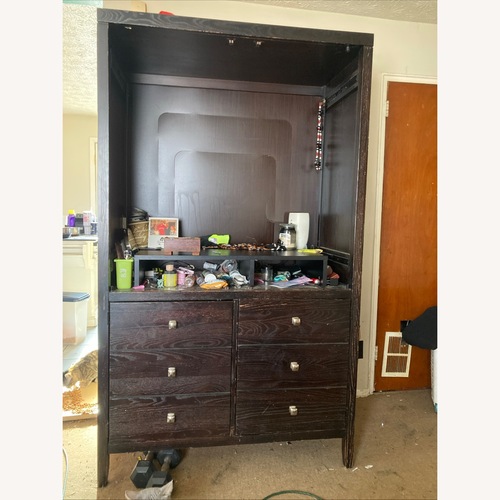 Used Dark Brown Wood Armoire for sale on AptDeco