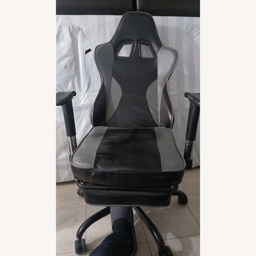 Used Light Gray Leather Office Chair for sale on AptDeco