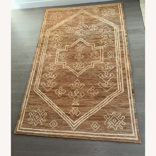 Used Ballard Designs Natural Jute Area Rug 5' x 8' for sale on AptDeco