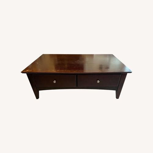 Used Brown Wood Coffee Table for sale on AptDeco