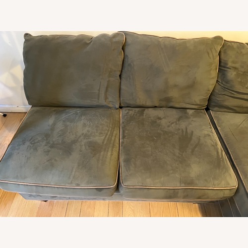 Used H.M. Richards Green Sectional for sale on AptDeco
