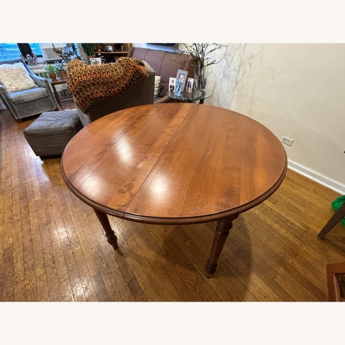 Used Antique Circular Dining Table for sale on AptDeco
