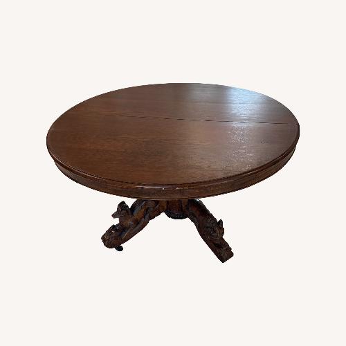 Used Vintage/antique Dark Brown Wood Dining Table for sale on AptDeco