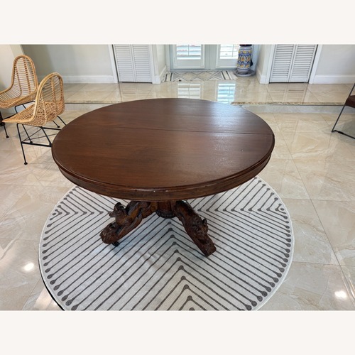 Used Vintage/antique Dark Brown Wood Dining Table for sale on AptDeco