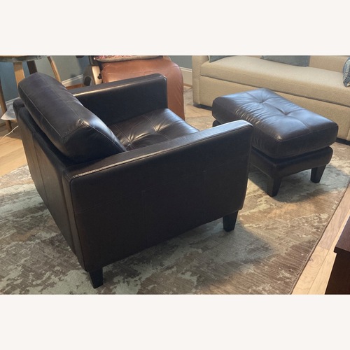 Used Dark Brown Leather Armchair With Ottoman for sale on AptDeco