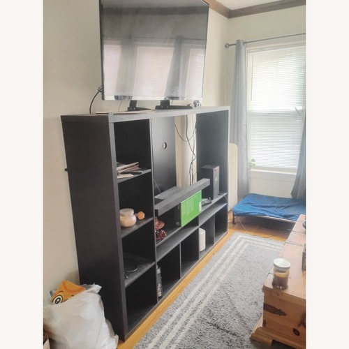 Used Black Entertainment Center  for sale on AptDeco