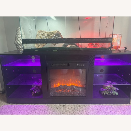 Used BREEZEHEAT Electric Fireplace TV Stand for sale on AptDeco