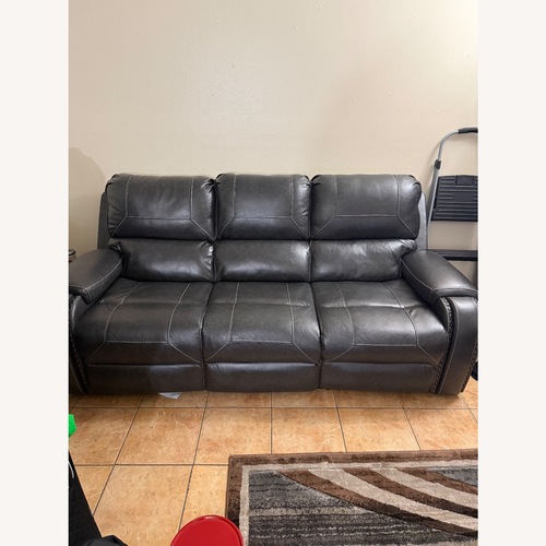 Used Leather Recliner Sofa with USB/Ac Connector for sale on AptDeco