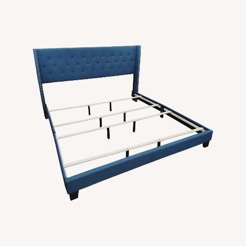 Used Blue King Upholstered Platform Bed for sale on AptDeco