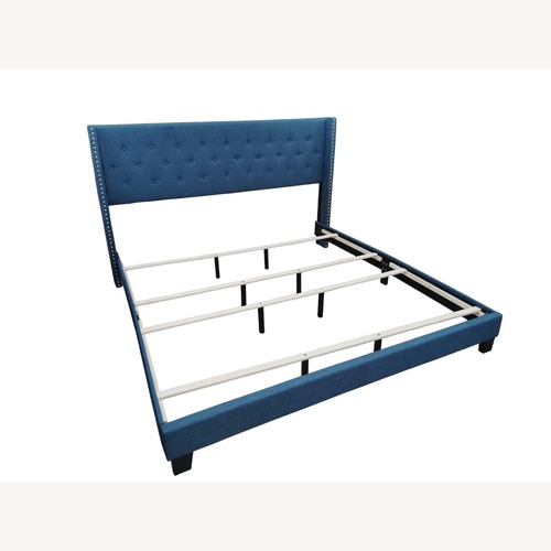 Used Blue King Upholstered Platform Bed for sale on AptDeco