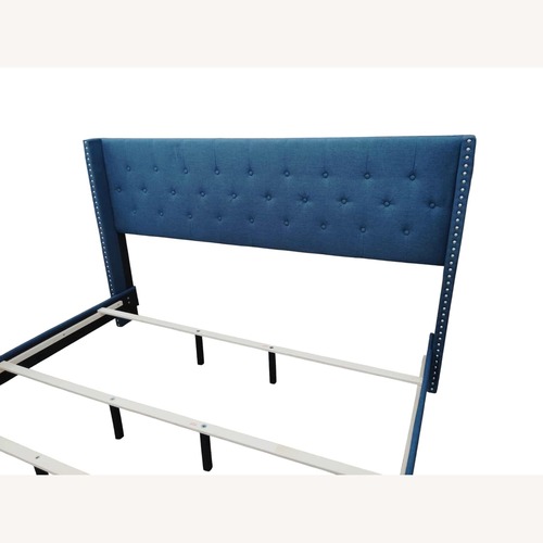 Used Blue King Upholstered Platform Bed for sale on AptDeco