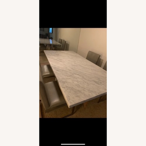 Used Light Gray Marble Dining Table for sale on AptDeco