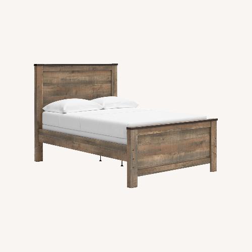 Used Ashley Furniture Trinell Full Panel Bed for sale on AptDeco