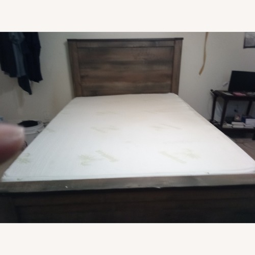 Used Ashley Furniture Trinell Full Panel Bed for sale on AptDeco