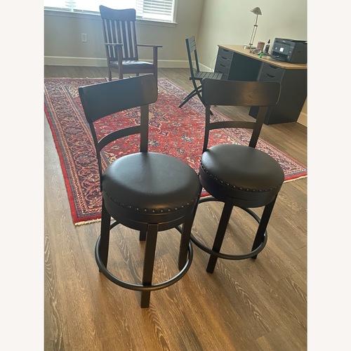 Used Black Swivel Counter Stools for sale on AptDeco
